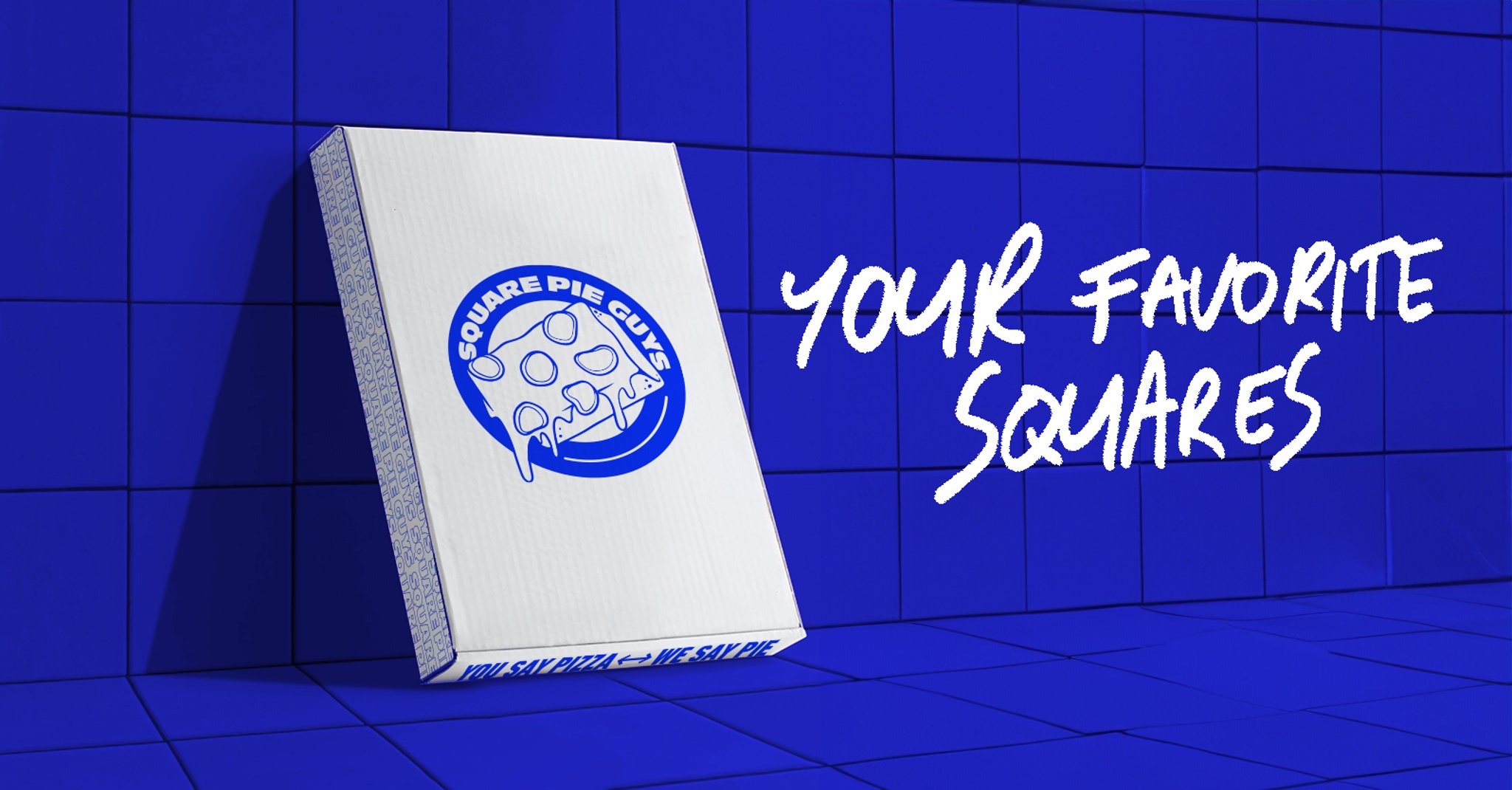 A cartoon-style pizza box with a blue logo and the text Square Pie Guys on a blue tiled wall.