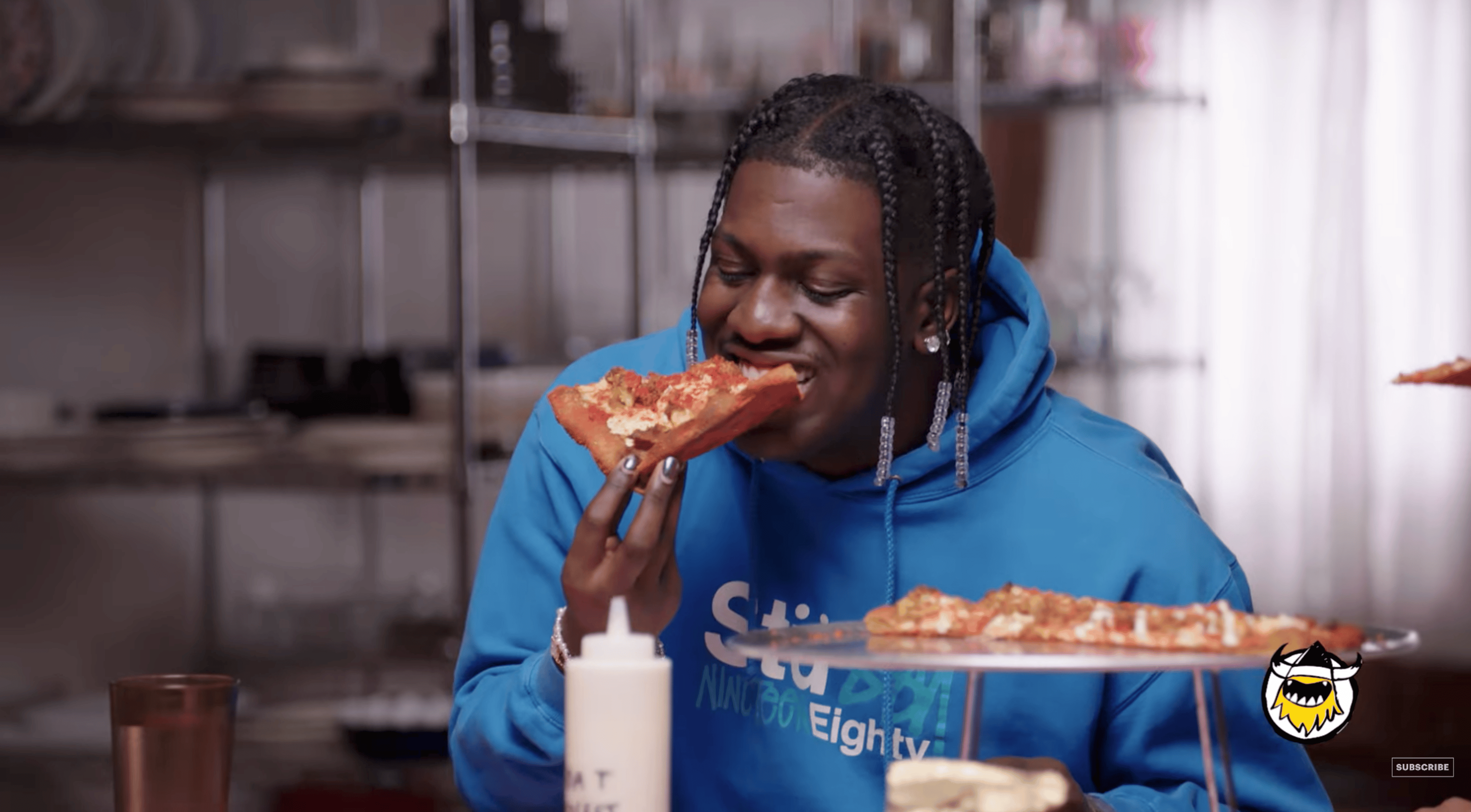 Lil Yachty enjoying Tony Boloney's pizza