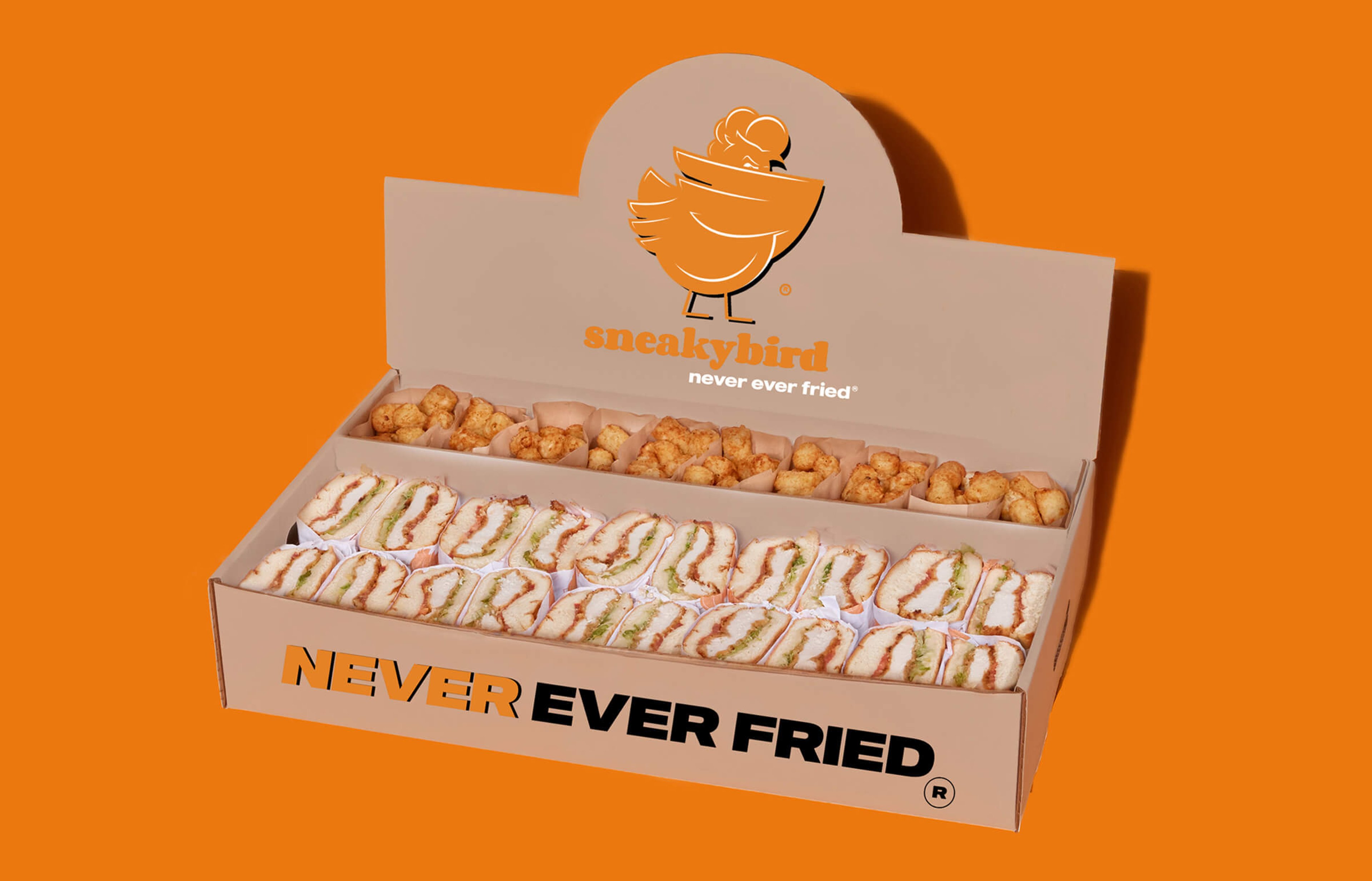 Sneakybird catering package: oven-grilled chicken sandwiches with crispy tots