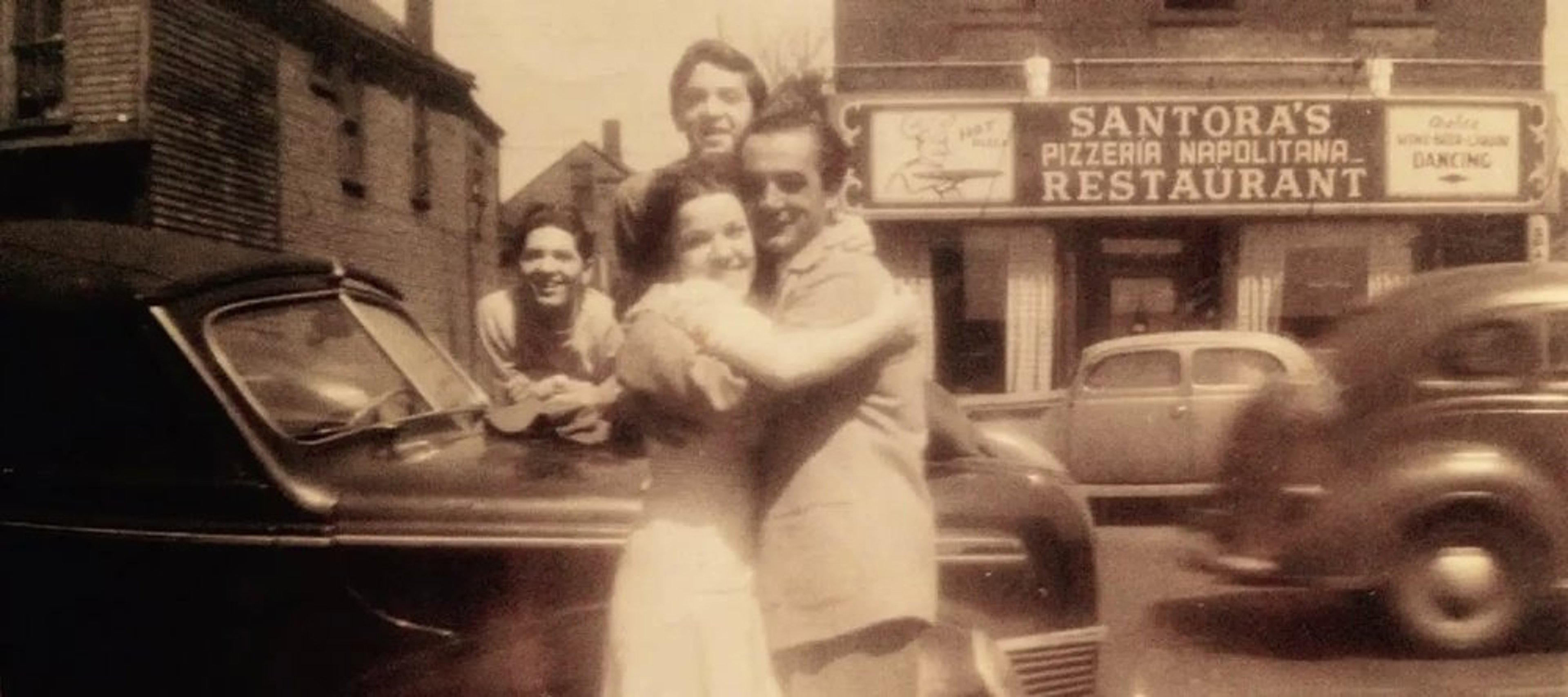 Vintage Santora's family photo outside the original location