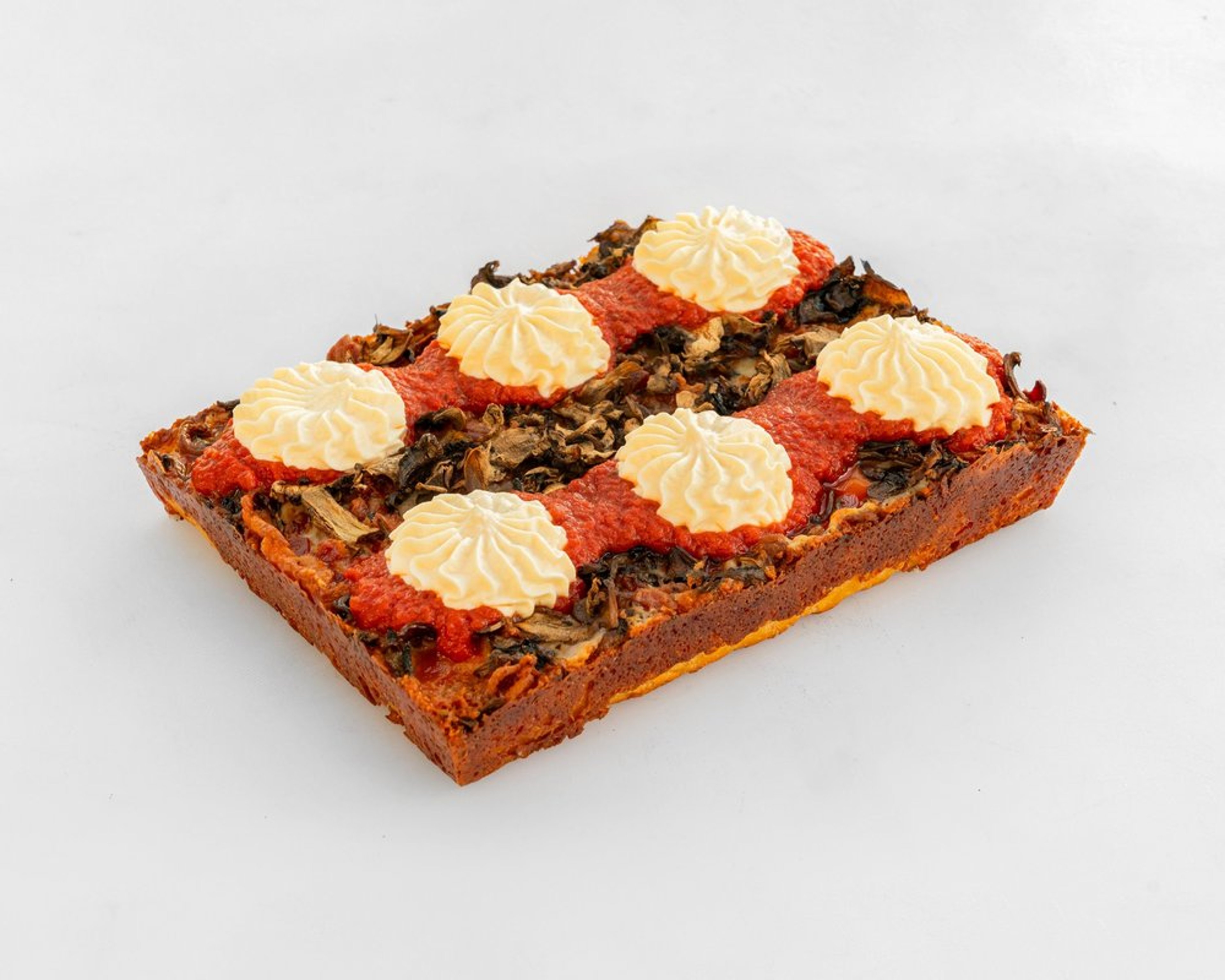 Bacon Me Crazy pizza with bacon, cremini mushrooms, ricotta and red sauce