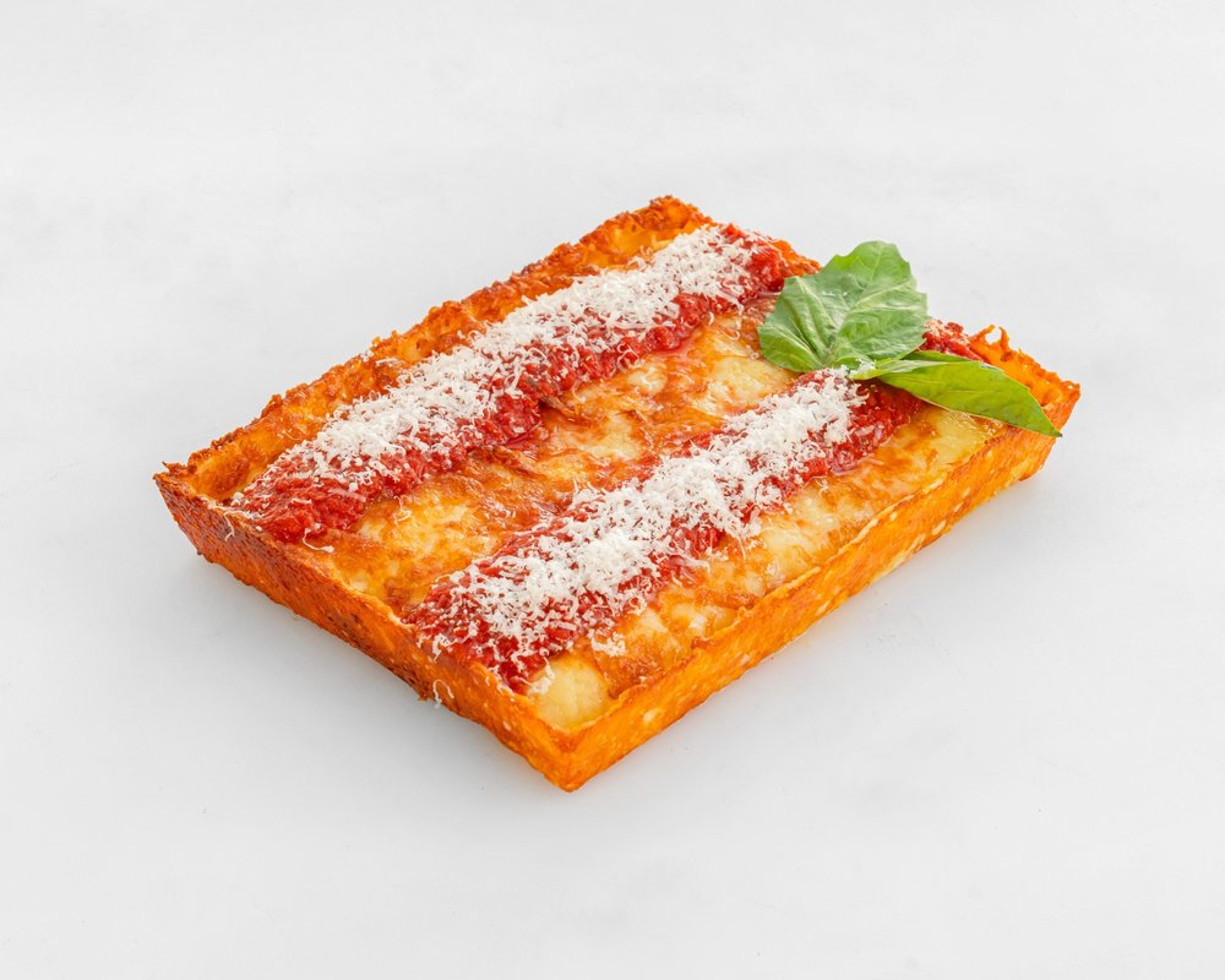 Classic Cheese Detroit-style pizza with crispy, caramelized cheese edges