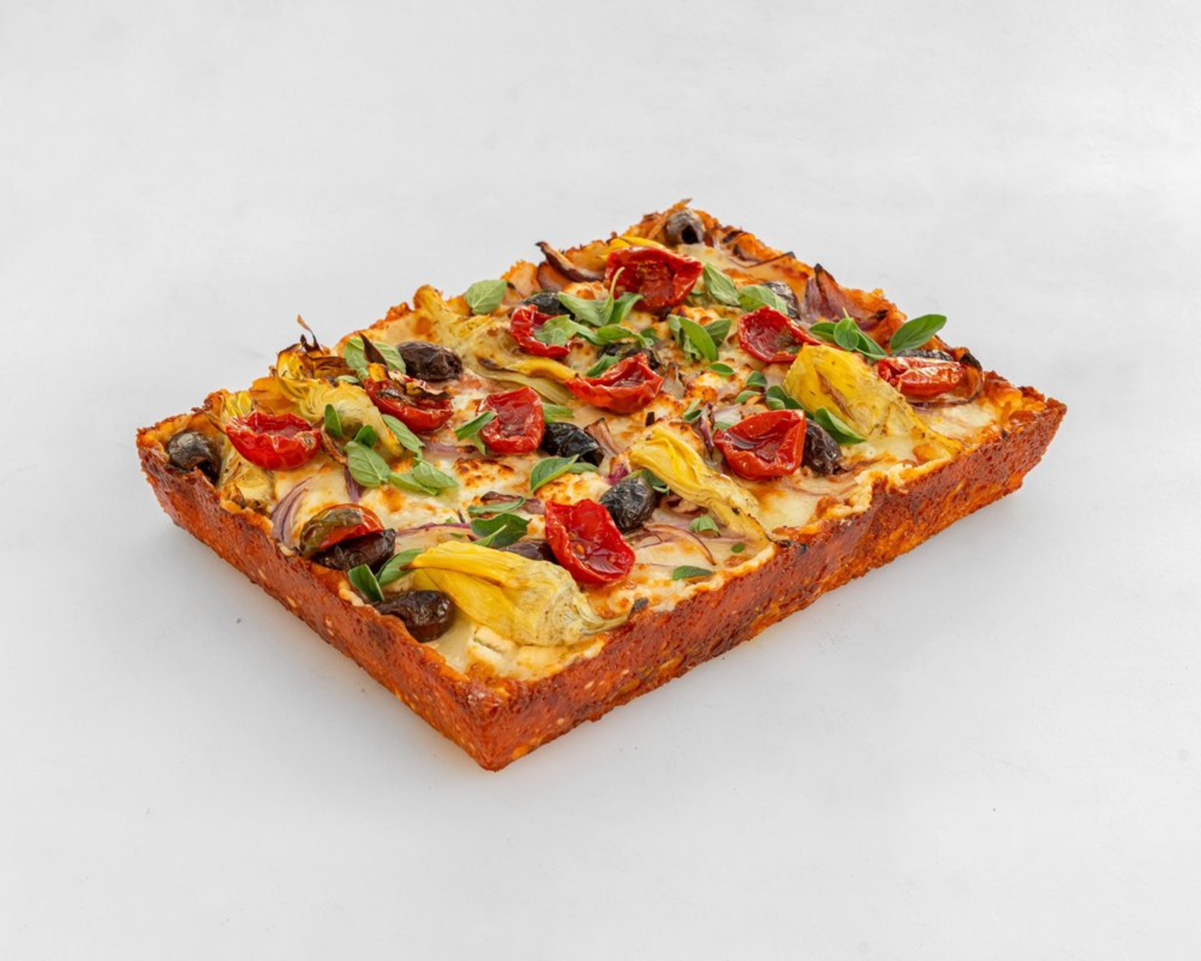 Greek pizza with artichoke, kalamata olives, red onion, feta and sun-dried tomato
