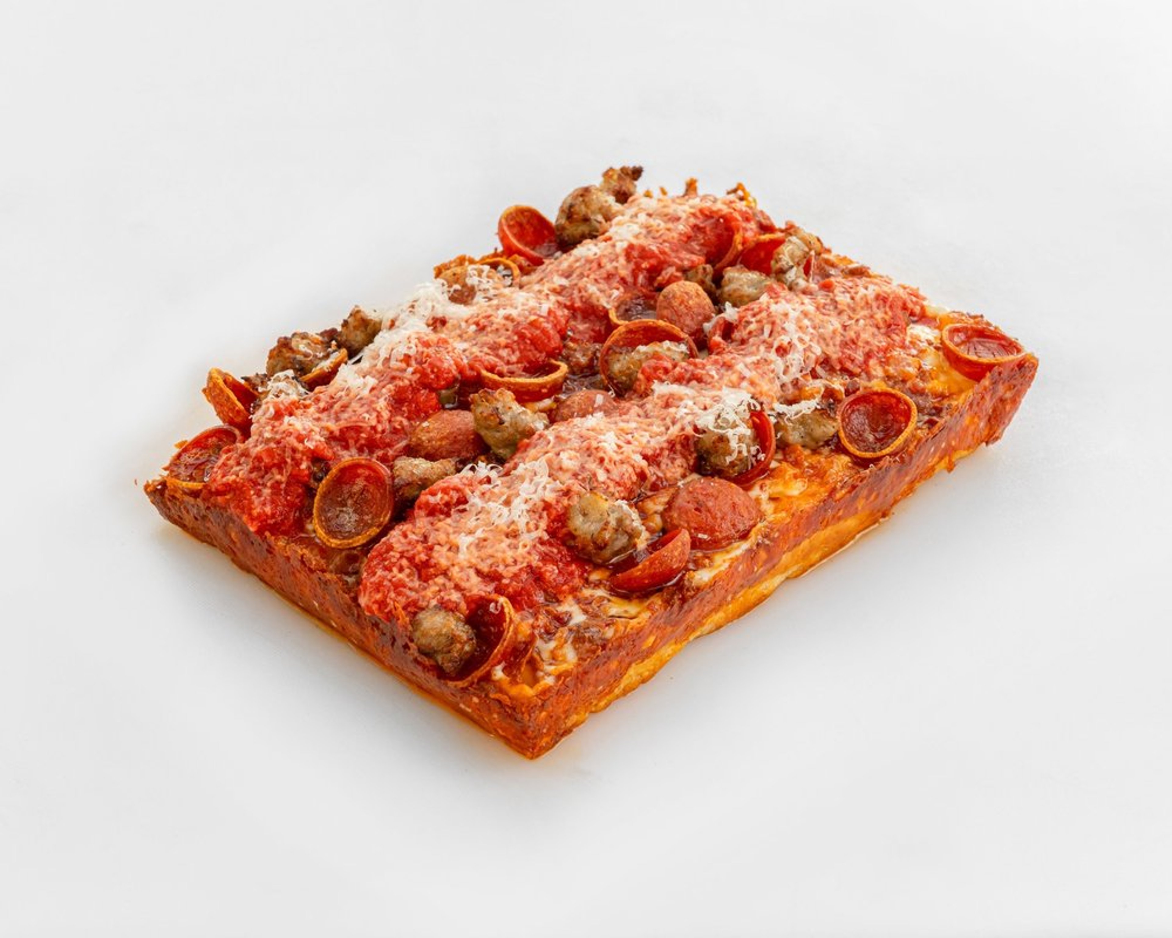 Meatzza pizza with sausage, bacon, pepperoni and red sauce