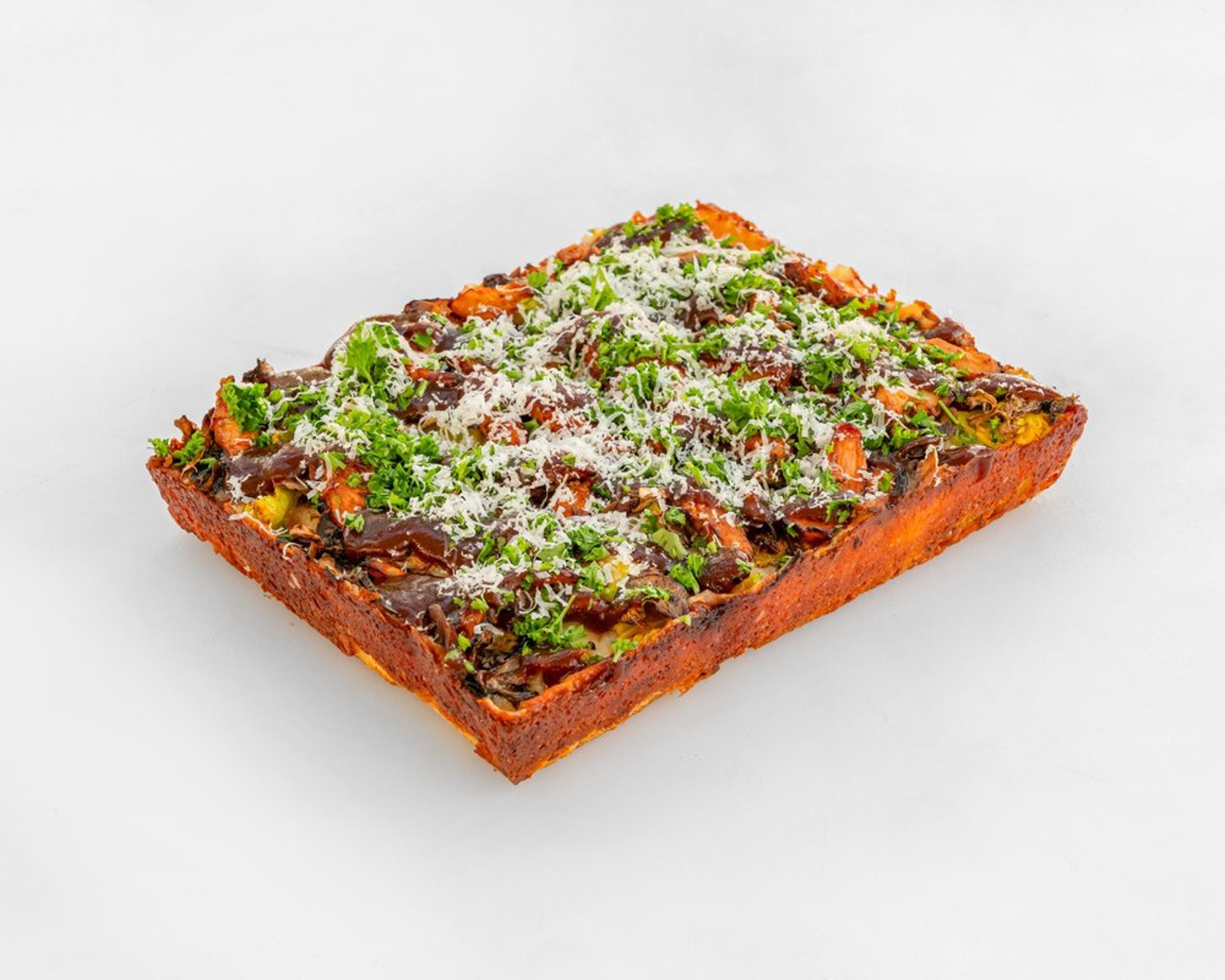 Smokin’ Hot Mother Clucker pizza with BBQ chicken, red onion, pepperoncini and mushrooms