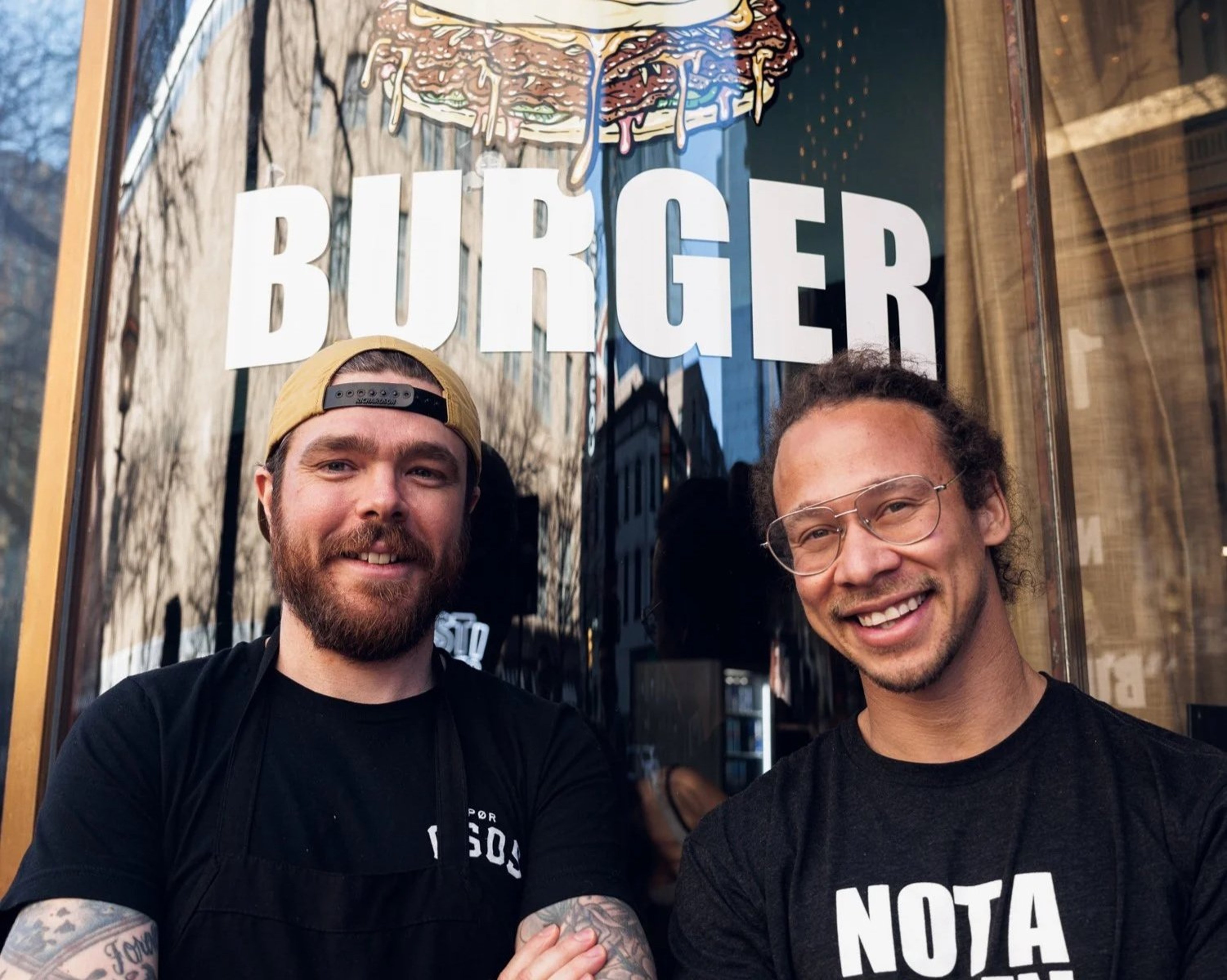 Co-owners of NADC Burger, Neen Williams and Phillip Frankland-Lee, stand in front of their NADC Burger location in downtown Fort Worth.