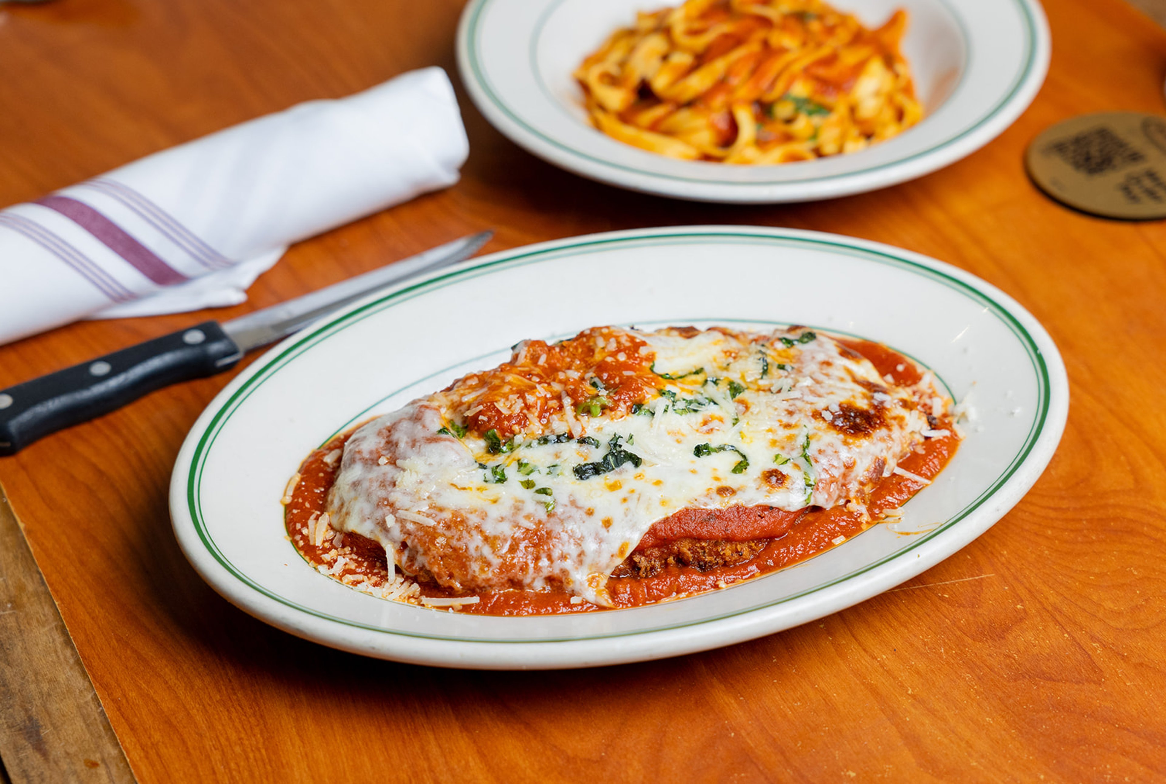 Chicken Parmesan with marinara and melted mozzarella