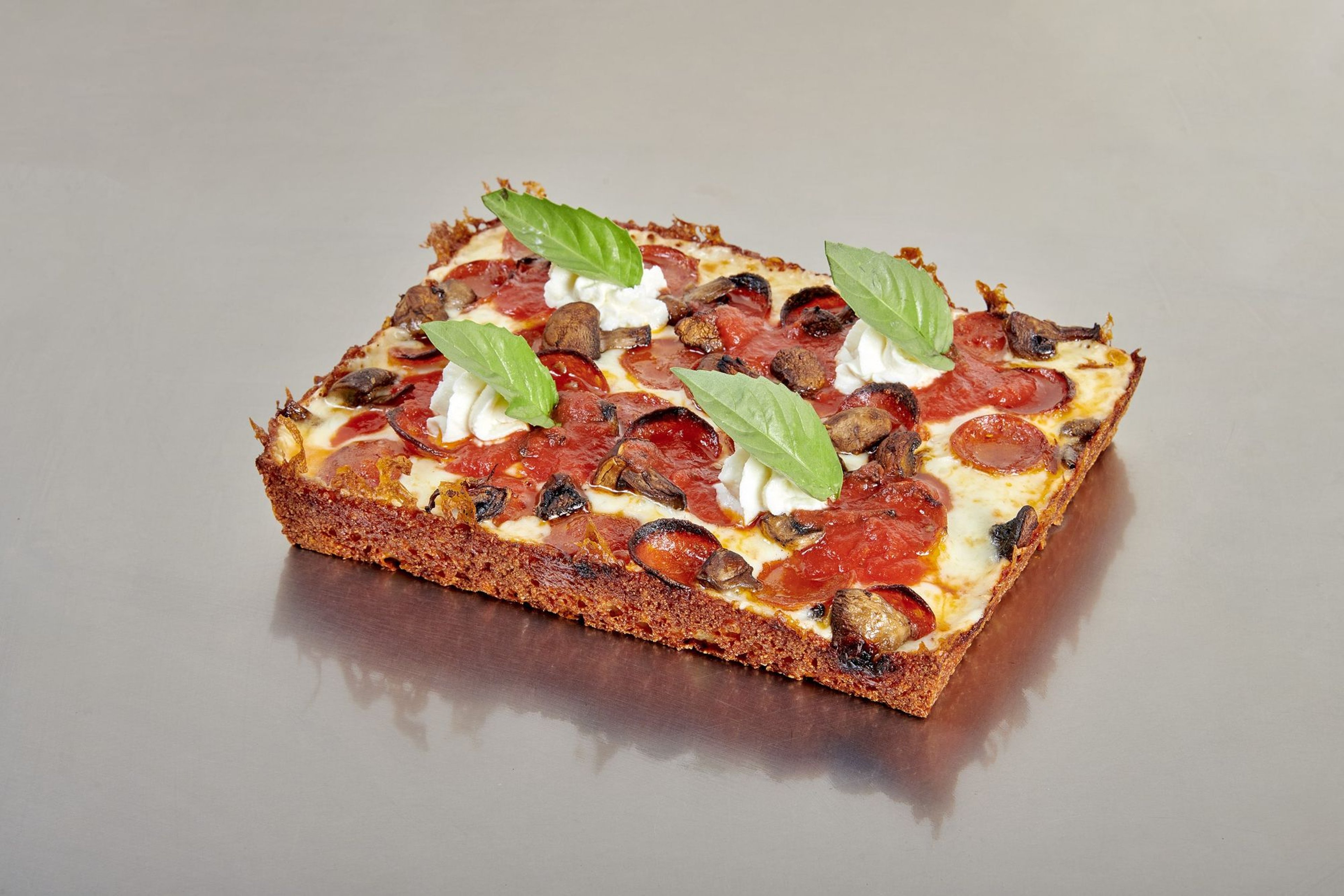 The Motorhead — Detroit style pizza with pepperoni, mushrooms, and ricotta