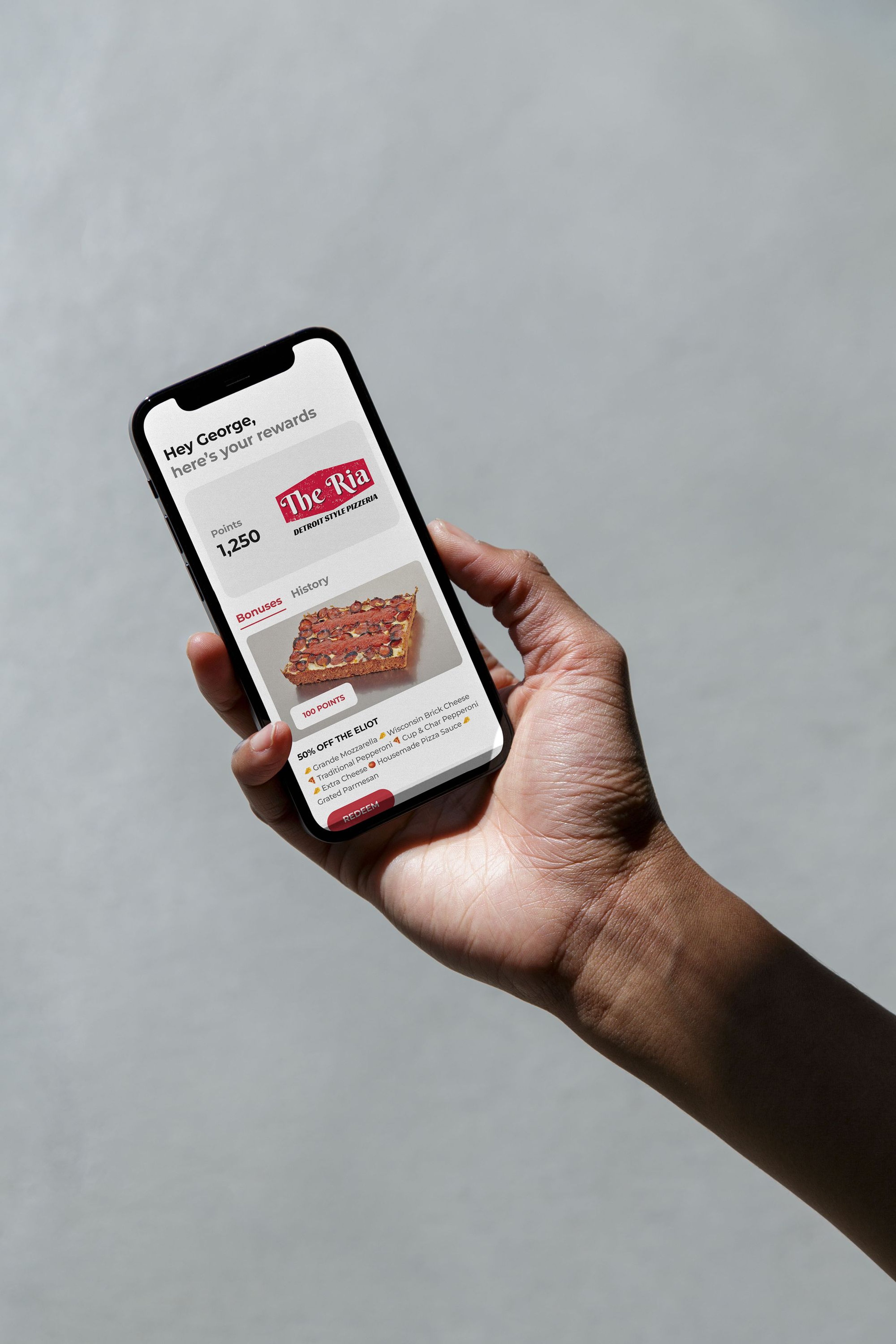 The Ria Pizzeria rewards shown in the mobile app