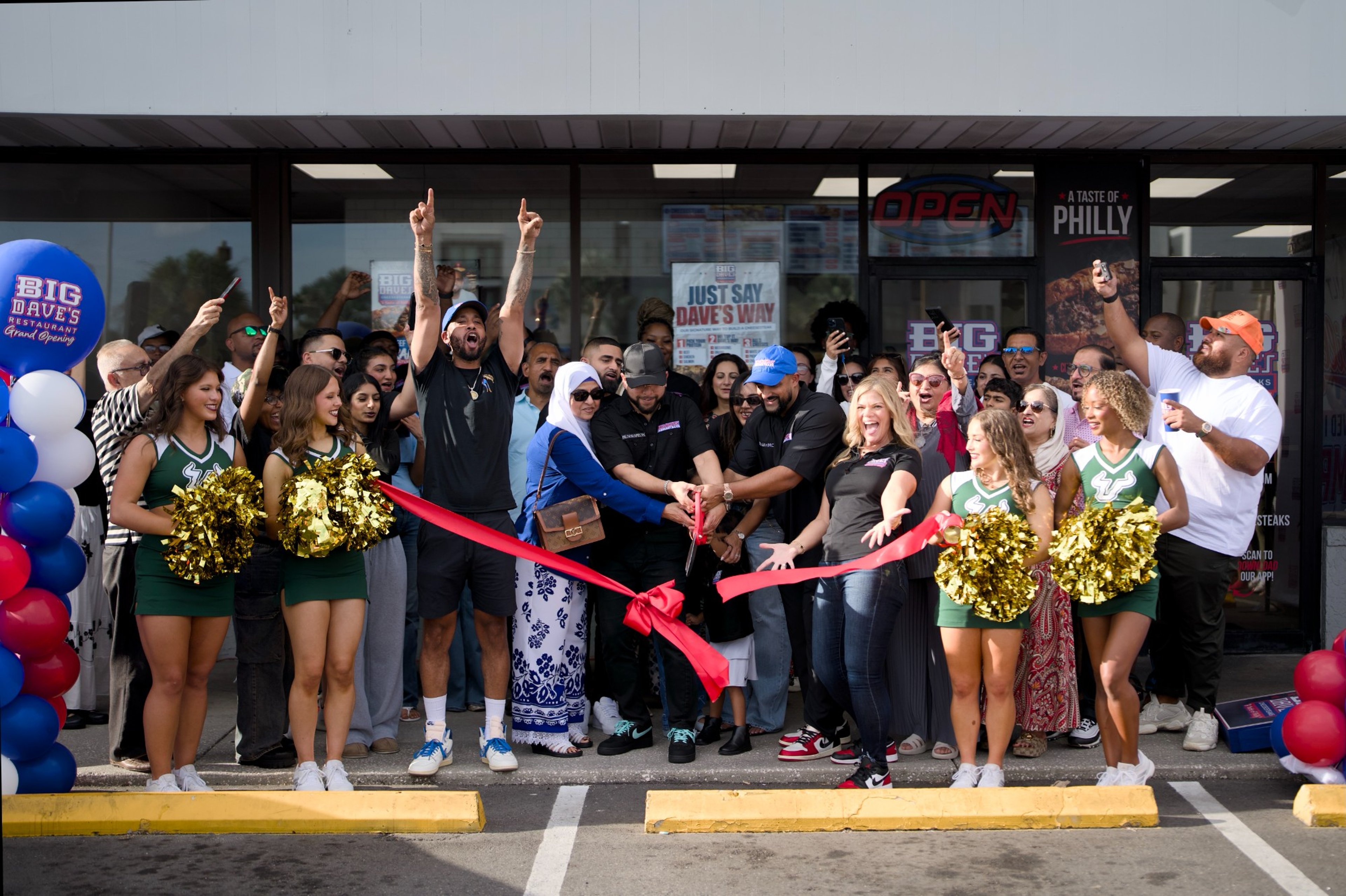 Experienced leadership at a Big Dave's Cheesesteaks grand-opening ribbon cutting